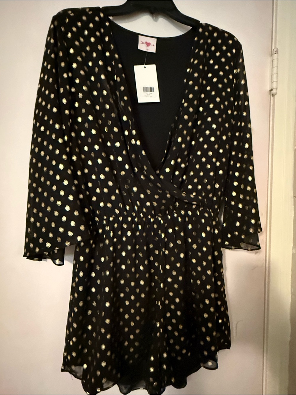 Swoon Boutique Black Long Sleeve Romper with Gold Polka Dots